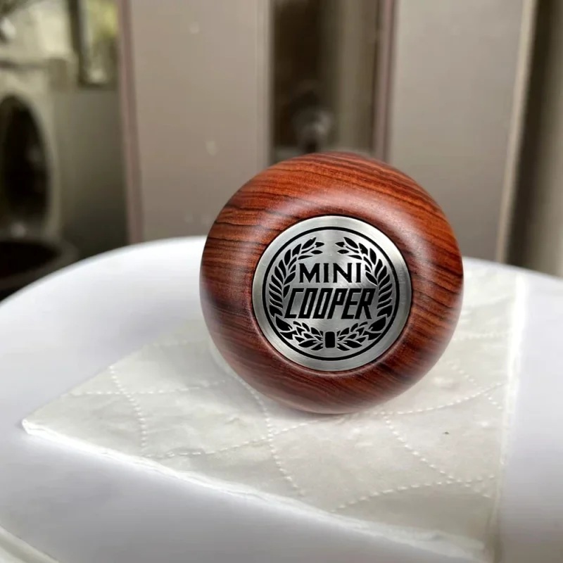 holz-schaltknauf-fuer-mini-cooper-logo